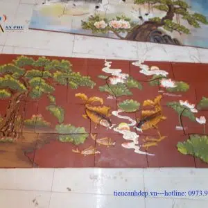 Tranh gốm cá chép trông trăng